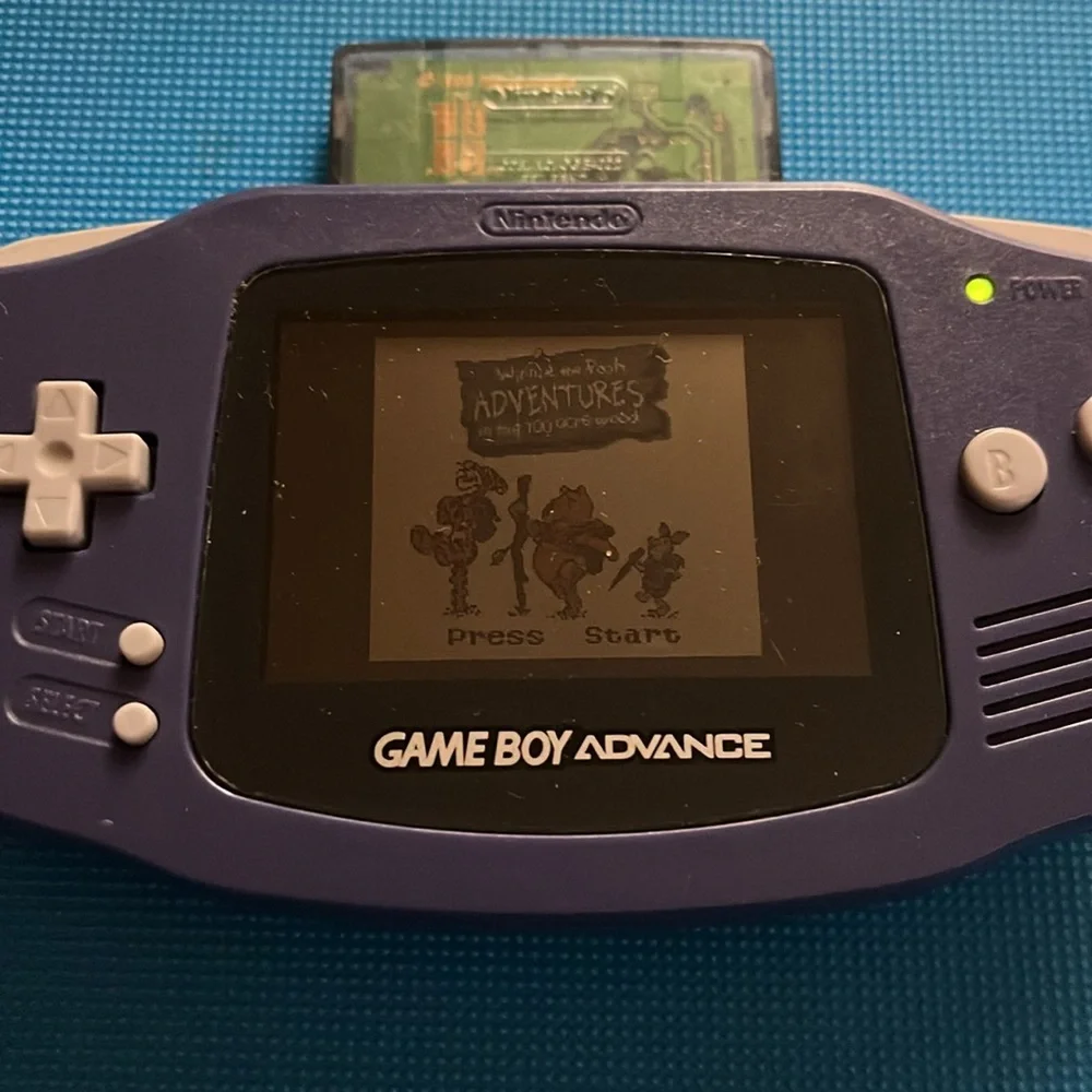 GAME BOY ADVANCE. PURPLE. BATTERY COVER MISSING. POOH GAME included